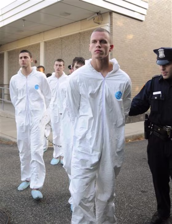 Jeffrey Conroy, 17, foreground, and other teens arrested in connection with the hate crime murder of an Ecuadorean immigrant,&nbsp;in the Fifth Precinct in Patchogue, N.Y. 